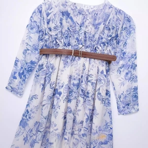 Blue floral long sleeve chiffon dress with ruffled collar and a brown slim belt included