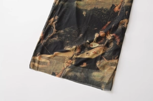 Detail of classical oil painting print on sheer black mesh fabric with translucent texture