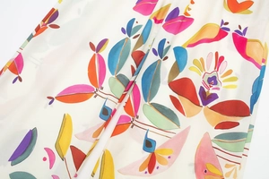 Close-up of lightweight poplin fabric with vibrant bohemian floral print details