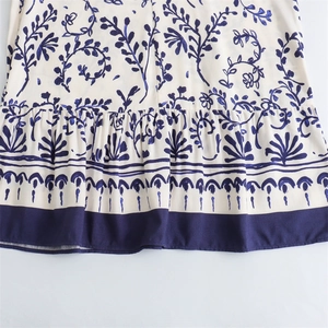French style floral mini dress with botanical print and ruffled hem for summer wear