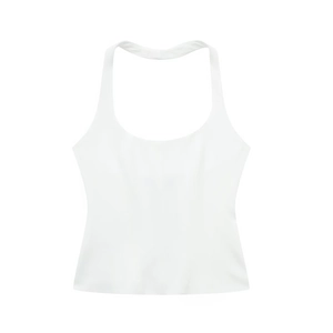 Detail of a white halter neck top featuring a deep U-neckline and smooth knit fabric