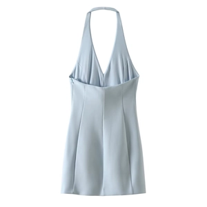 Detail of light blue halter neck dress with deep V-neckline and open back design