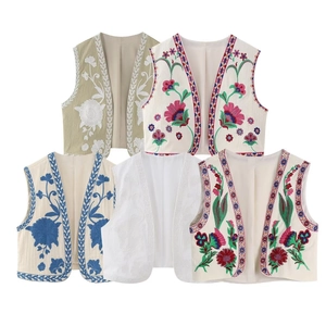 Detailed embroidery patterns on various colors of vintage style sleeveless vests