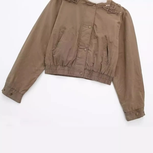 Short brown bomber jacket for women featuring metal buttons and vintage shoulder embroidery