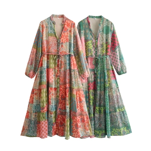 Detail of boho patchwork print maxi dresses with V-neckline and drawstring waist design