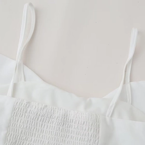 White smocked poplin camisole top with thin spaghetti straps for summer fashion