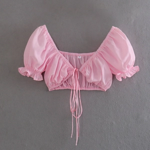 Pink flared sleeve crop top with deep V-neck and tie-up front design for summer