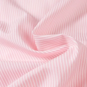 Close-up of pink and white striped shirt fabric with smooth glossy finish and soft drape
