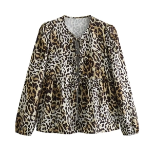 Women's leopard print long sleeve shirt with bow tie closure and peplum hem details