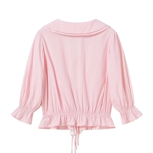 Pink and white striped long sleeve women's shirt with wide collar and ruffled hem back view
