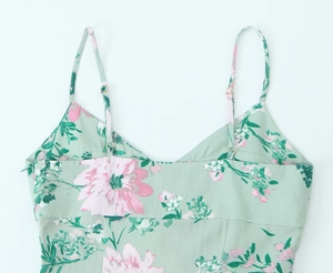 Detail of adjustable strap and floral print on linen blend midi dress for women