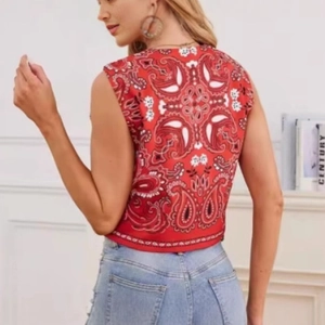 Red paisley print sleeveless top with round neck and tie-back detail for women