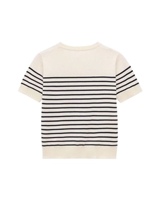 Detail of classic breton striped knit top with crew neck and ribbed cuffs on white background