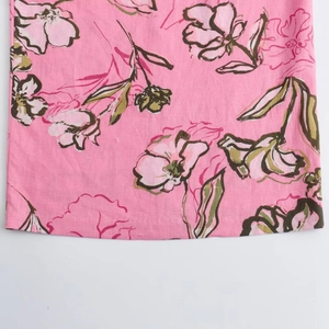 Abito estivo da donna in misto lino con stampa floreale bianca su base rosa chic