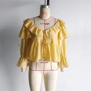 Yellow off-shoulder chiffon blouse with ruffles and bell sleeves for summer vacation