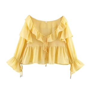 Pale yellow off-shoulder chiffon blouse with ruffles and flared sleeves for summer