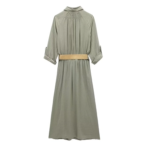 Detail view of the back elastic ruching and straw belt on a linen blend shirt dress