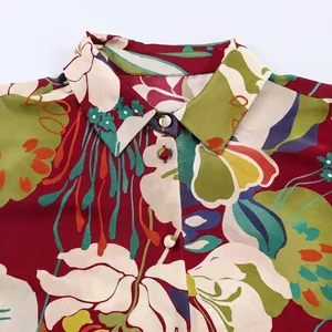 Vintage floral print shirt in red satin texture with standard lapel and white buttons