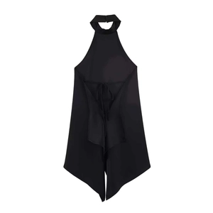 Detail of back view showing lace-up thin straps and asymmetric pointed hem on black top