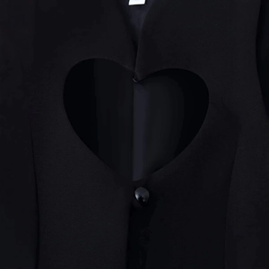 Women's black blazer with heart-shaped cutout detail and single black button closure