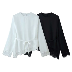Women's crewneck chiffon blouse with lace trim hem and waist tie in white and black