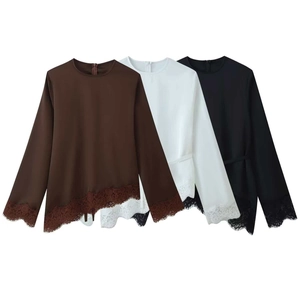 Women's crewneck long sleeve top with lace patchwork hem and cuffs in multiple colors