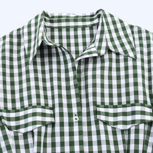 Slim fit green gingham short sleeve shirt dress with spread collar and flap pockets