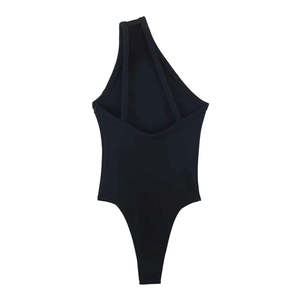 Detail of black one-shoulder bodysuit with irregular strap design and slim fit cut
