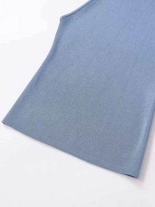 Detail of light blue ribbed knit tank top showing high-quality fabric texture and stitching