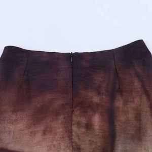 Close-up of vintage gradient brown skirt waist with seamless invisible zipper detail