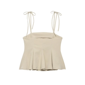 Chic beige peplum camisole top with bow tie shoulder straps and ruffled hem design