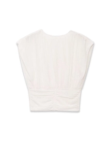 Detail of sun-ray pleats and elastic waist on cream sleeveless knit tank top