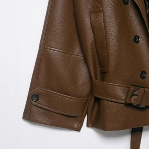 Brown vintage faux leather jacket featuring textured finish with belt and sleeve strap