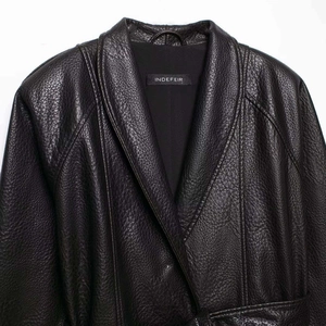 Classic black faux leather jacket with lapel collar and belted waist for women