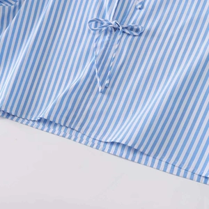 Blue and white vertical striped poplin shirt for women with elegant front tie bow detail