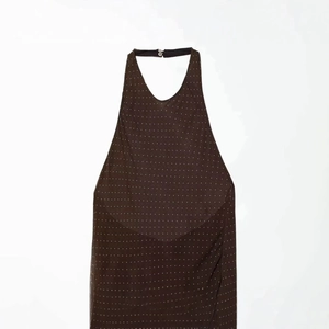 Minimalist coffee brown halter dress with white polka dots and V-neckline detail