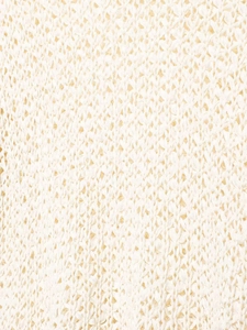 Detailed macro view of white hollow-out crochet knit fabric with floral diamond texture