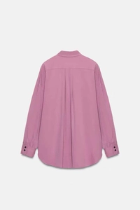 Back view of long sleeve shirt with box pleat and curved hem in purple woven fabric