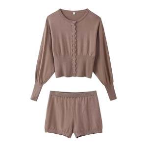 Women's brown knit set with button-up cardigan and matching shorts featuring wavy edges