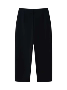 Detail of high-waisted black straight trousers with professional draping fabric