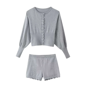 Women's grey knit two-piece set with long sleeve cardigan and matching shorts