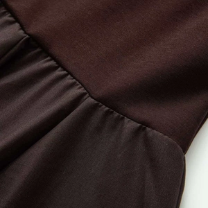 Minimalist dark brown boat neck short sleeve dress with gathered stitching detail