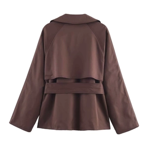 Back view of a brown trench coat featuring a storm flap and an adjustable waist belt