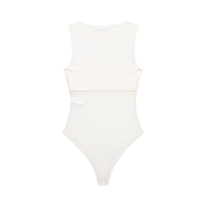 Detail of ivory sleeveless bodysuit showing mesh拼接 and bottom snap fasteners