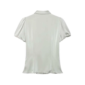 Detailed back view of a satin short sleeve shirt showing the puff sleeves and lapel collar