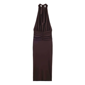 Detail of ruched waist and tie-up halter neck on a chocolate brown midi dress