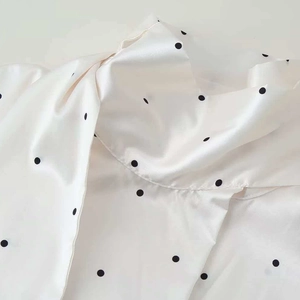 Chic women's white polka dot satin scarf-style shirt with elegant silk texture