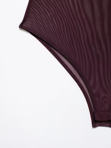 Close-up of dark purple sheer mesh fabric detail and edge stitching of the bodysuit