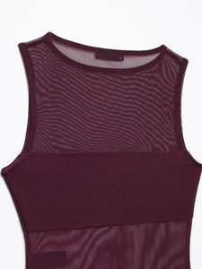 Detailed view of dark purple mesh paneling and knit fabric on a sleeveless bodysuit