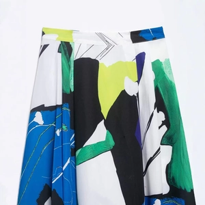 Fashionable high waist midi skirt with abstract blue and green art print in A-line cut